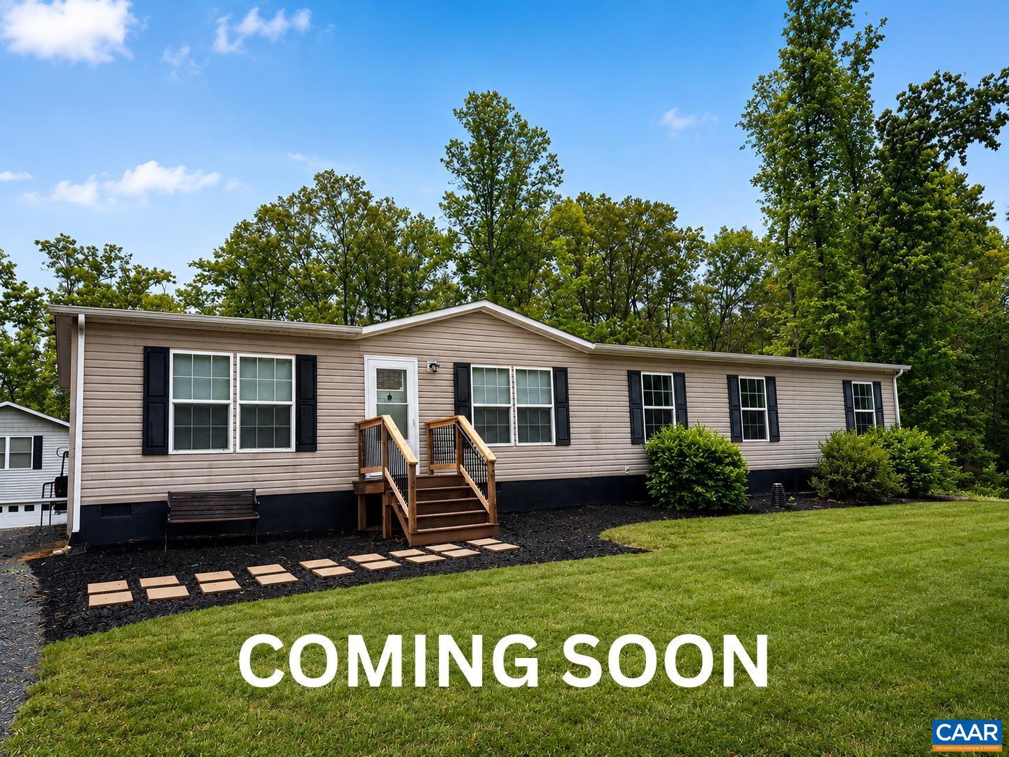 6031 Celt Road Stanardsville, VA 22973 - Photo 1 of 1 a front view of a house with garden