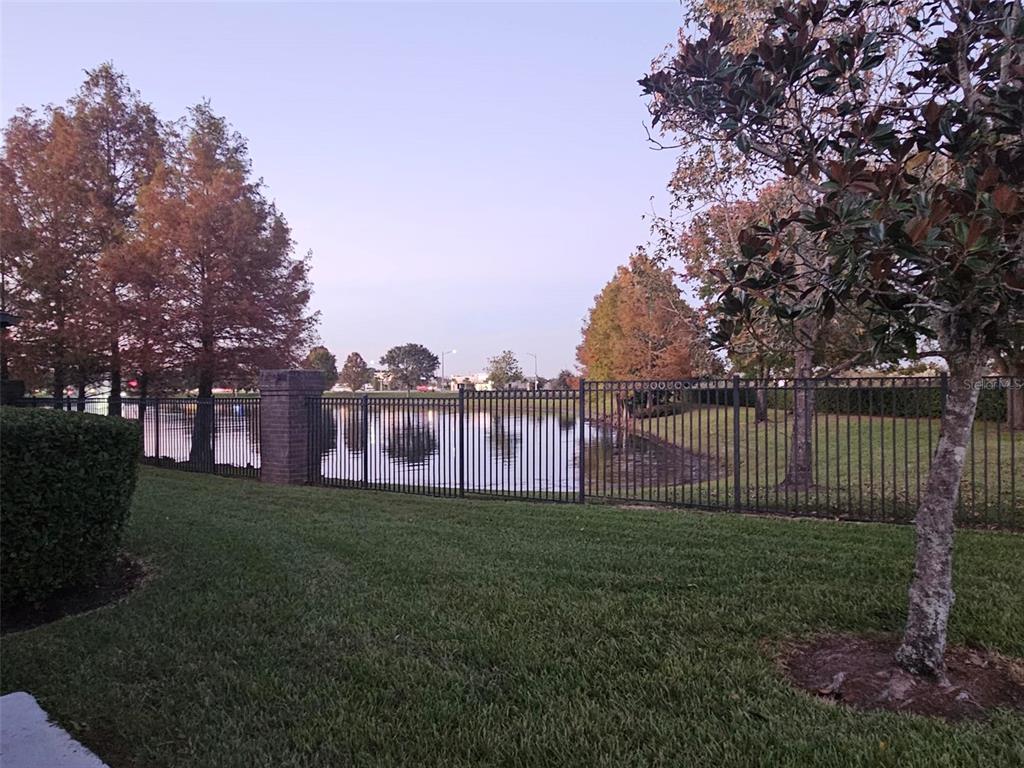 1215 Shallcross Avenue Orlando, FL 32828 - Photo 15 of 44 a garden with wooden fence