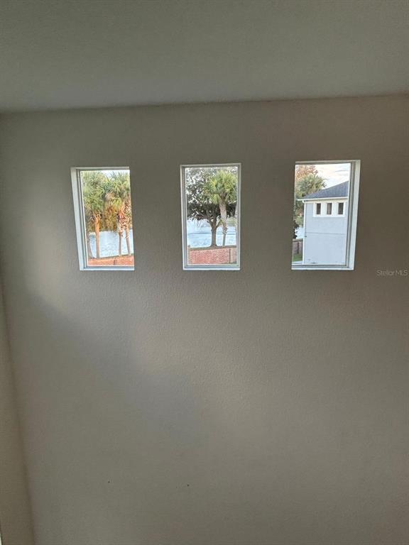 1215 Shallcross Avenue Orlando, FL 32828 - Photo 41 of 44 an empty room with windows