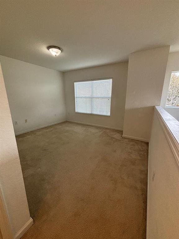 1215 Shallcross Avenue Orlando, FL 32828 - Photo 44 of 44 an empty room with windows