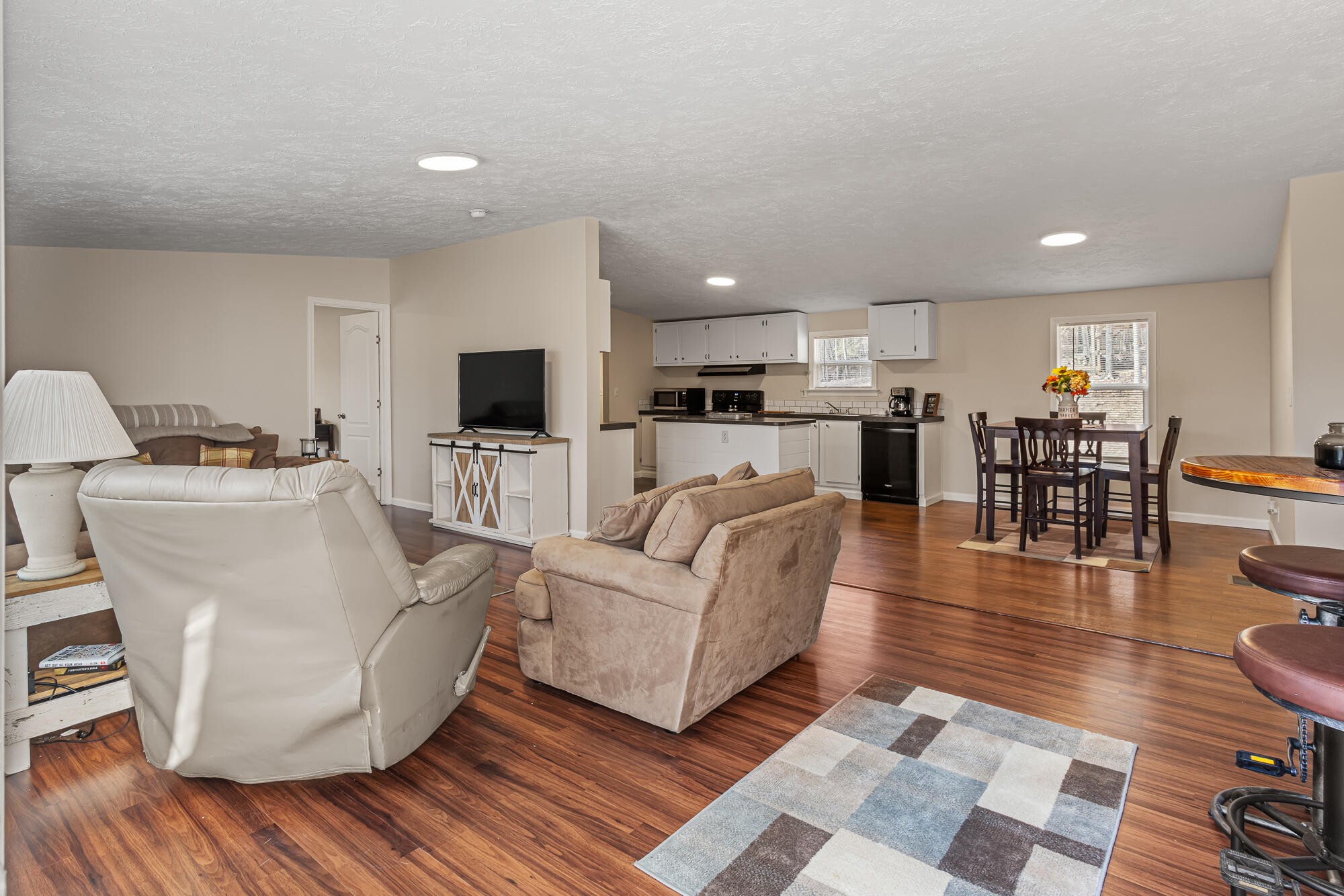 185 Bivens Road Tellico Plains, TN 37385 - Photo 13 of 34 a living room with furniture and a view of kitchen