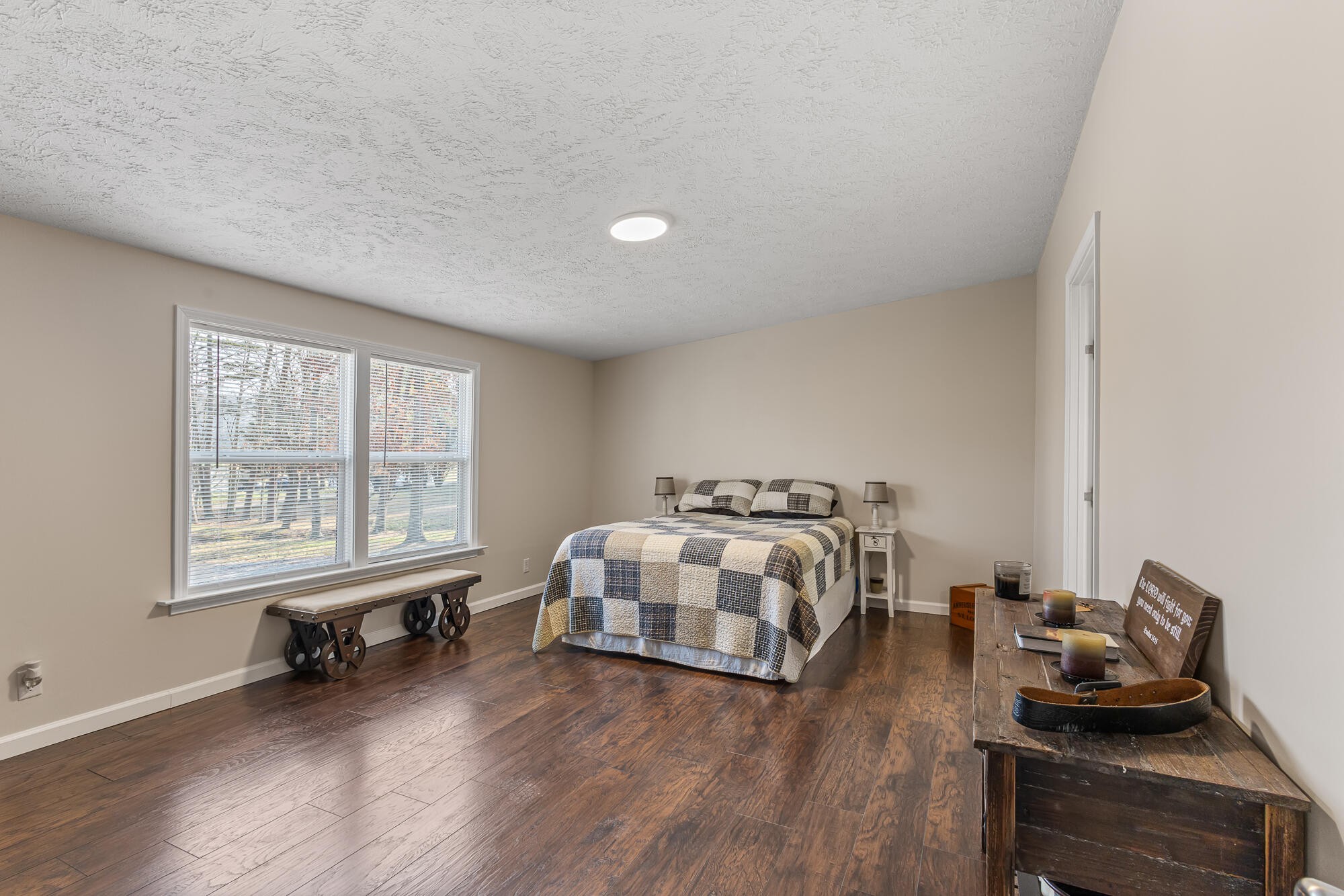 185 Bivens Road Tellico Plains, TN 37385 - Photo 22 of 34 a bedroom with a bed and a window