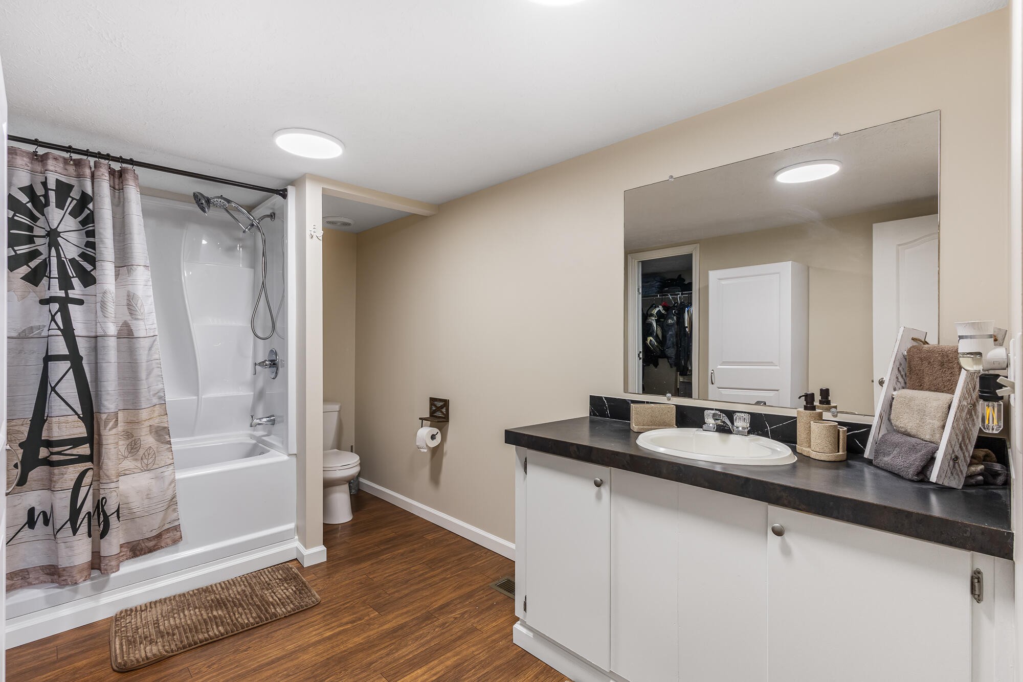 185 Bivens Road Tellico Plains, TN 37385 - Photo 26 of 34 a bathroom with double vanity and a mirror
