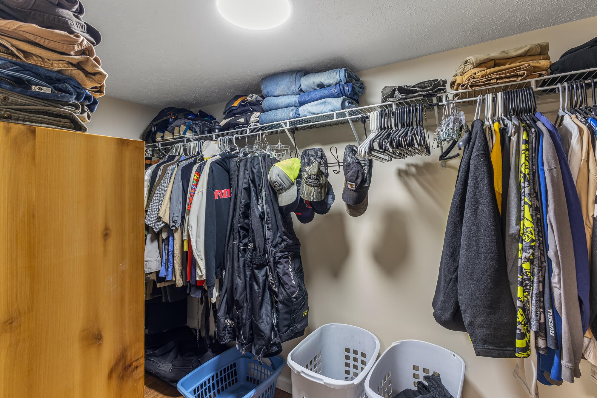 185 Bivens Road Tellico Plains, TN 37385 - Photo 28 of 34 a view of walk in closet with clothes
