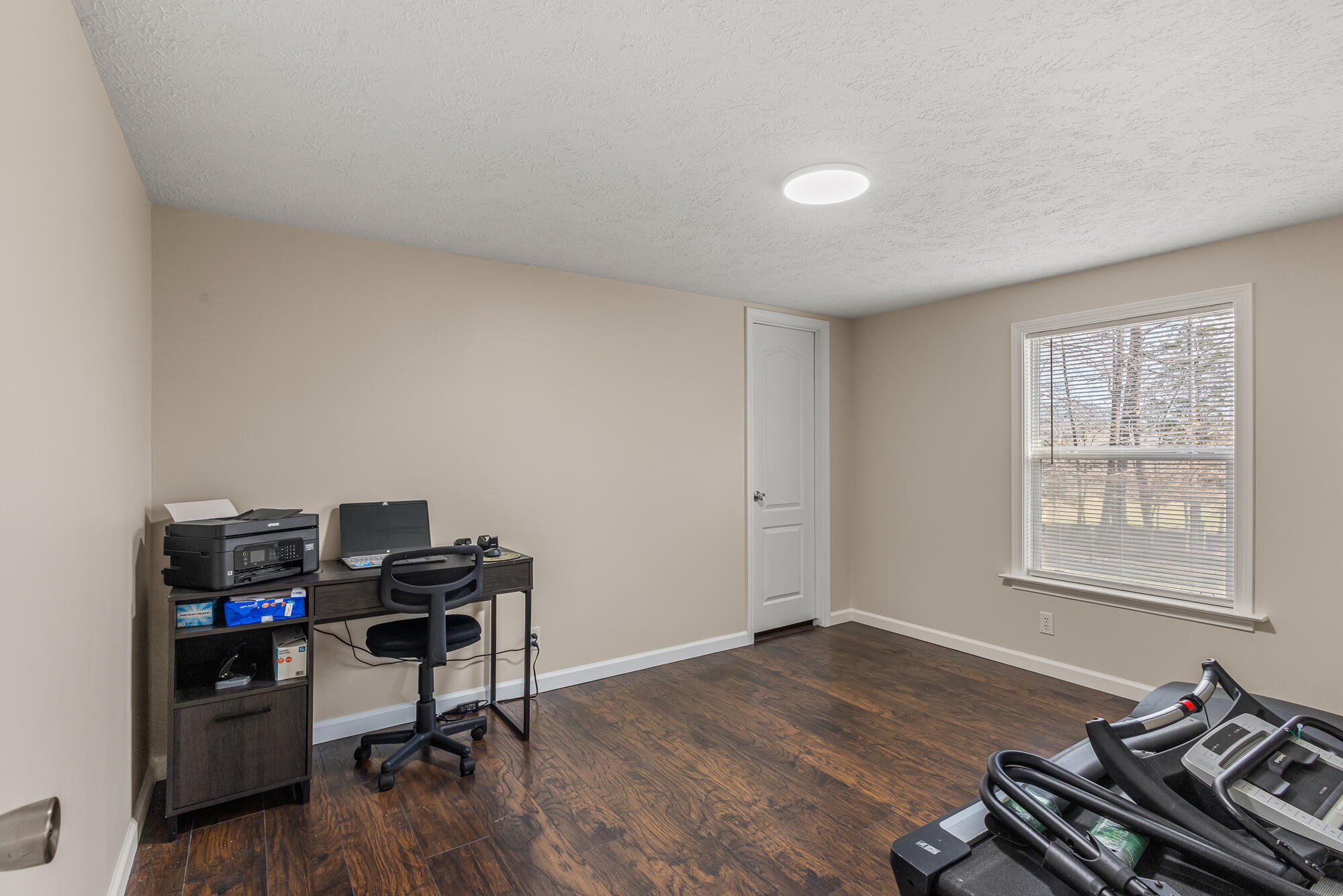 185 Bivens Road Tellico Plains, TN 37385 - Photo 29 of 34 a view of a workspace with furniture and a window