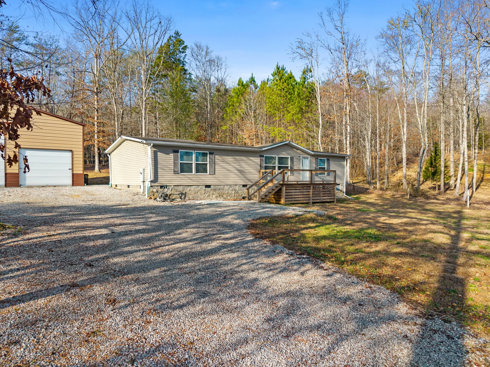 185 Bivens Road Tellico Plains, TN 37385 - Photo 3 of 34 a view of a house with a yard