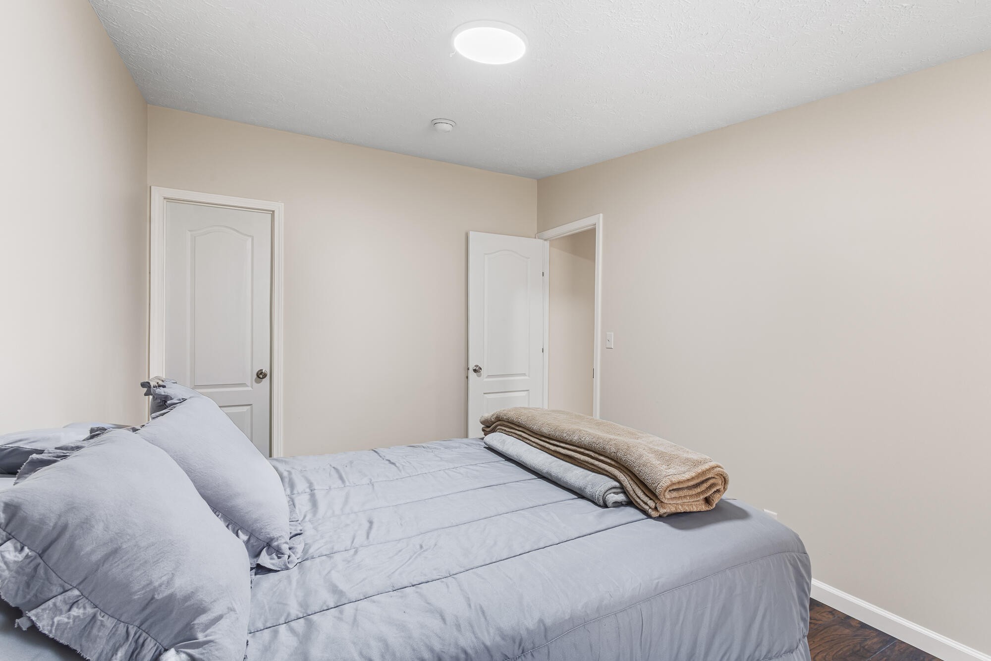 185 Bivens Road Tellico Plains, TN 37385 - Photo 32 of 34 a bedroom with a bed and a window
