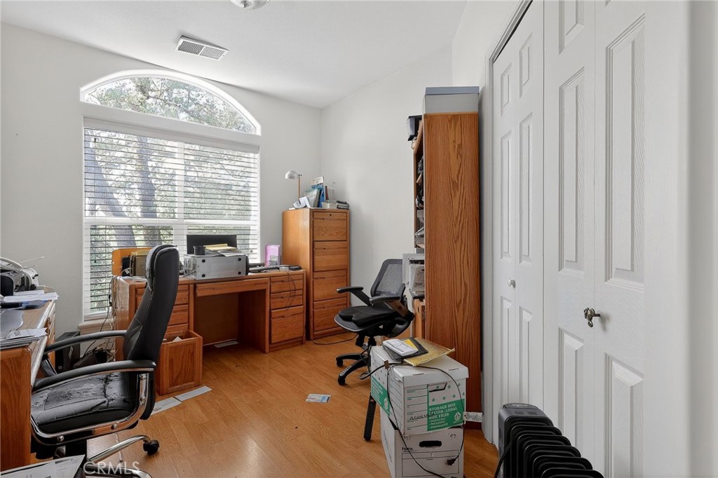 19370 Park Ridge Drive Hidden Valley Lake, CA 95467 - Photo 9 of 61 a view of a workspace with furniture and a window