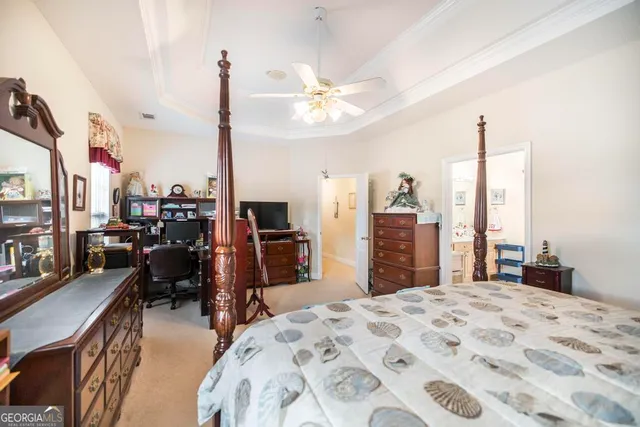 a bathroom with a sink vanity and mirror