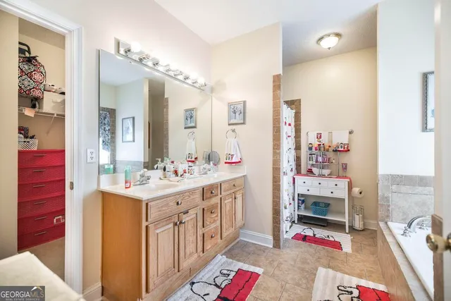 a kitchen with stainless steel appliances a sink and a stove