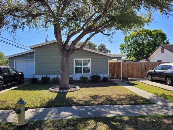 a view of a house with couches in front of house