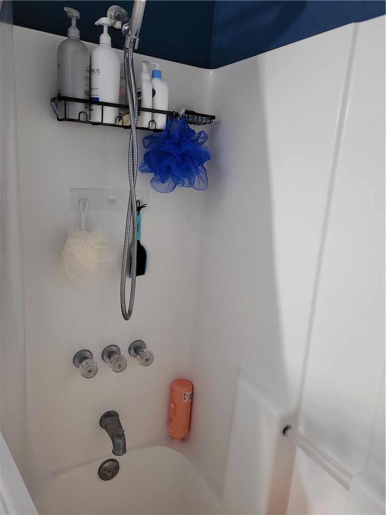 4902 Marion Circle Corpus Christi, TX 78411 - Photo 12 of 27 a bathroom with a shower
