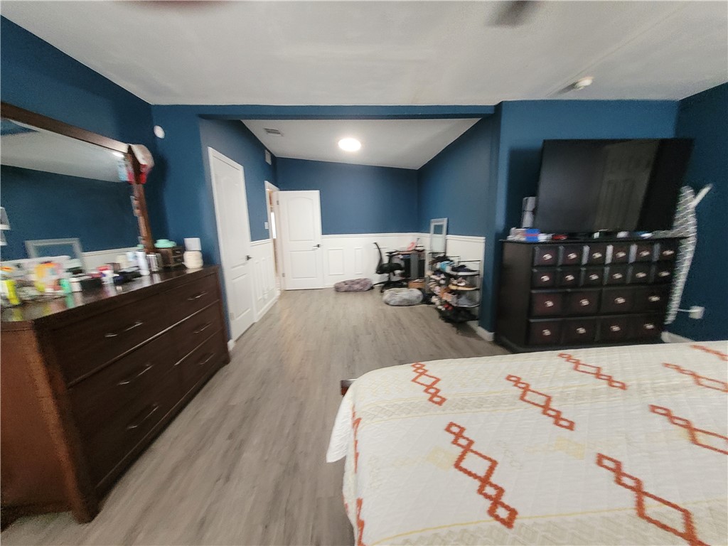 4902 Marion Circle Corpus Christi, TX 78411 - Photo 14 of 27 a bed room with a bed and a television