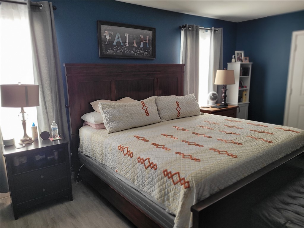 4902 Marion Circle Corpus Christi, TX 78411 - Photo 15 of 27 a bedroom with a bed and a window
