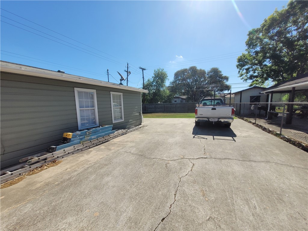 4902 Marion Circle Corpus Christi, TX 78411 - Photo 22 of 27 a car parked in front of house