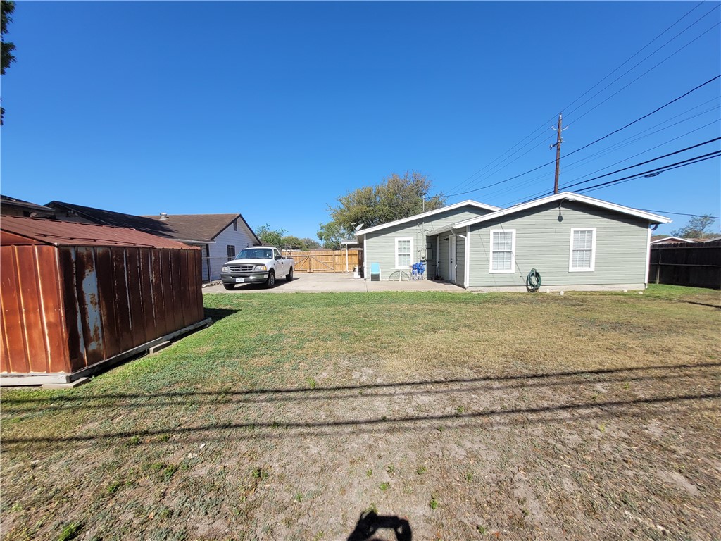 4902 Marion Circle Corpus Christi, TX 78411 - Photo 24 of 27 a front view of a house with a yard