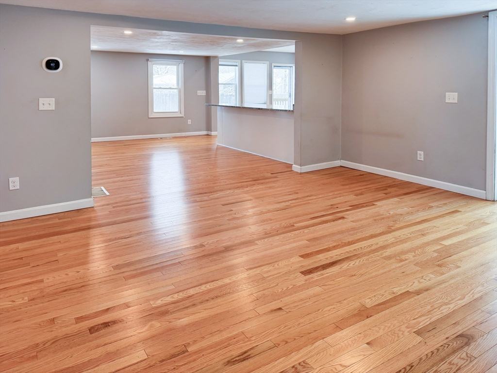 1 Chapel Lane Wareham, MA 02538 - Photo 15 of 29 a view of empty room with wooden floor and fan