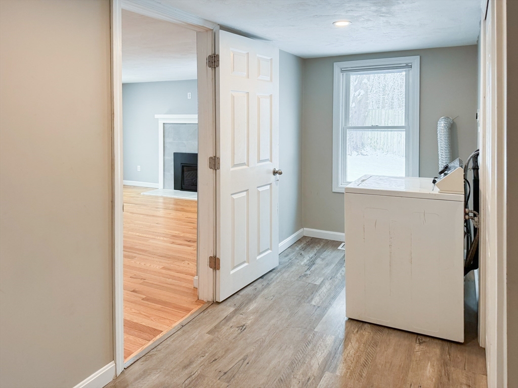 1 Chapel Lane Wareham, MA 02538 - Photo 16 of 29 a view of hallway with wooden floor