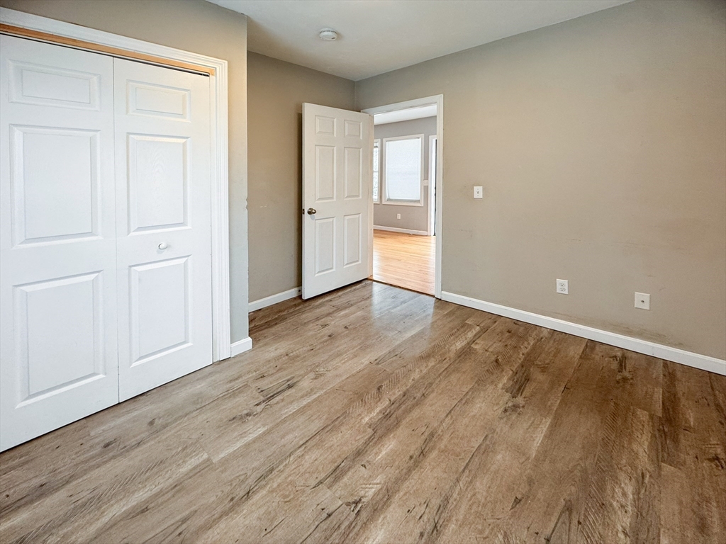 1 Chapel Lane Wareham, MA 02538 - Photo 22 of 29 a view of an empty room and wooden floor