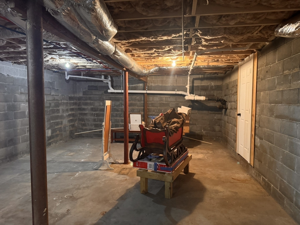 1 Chapel Lane Wareham, MA 02538 - Photo 26 of 29 a view of a room with wooden chairs