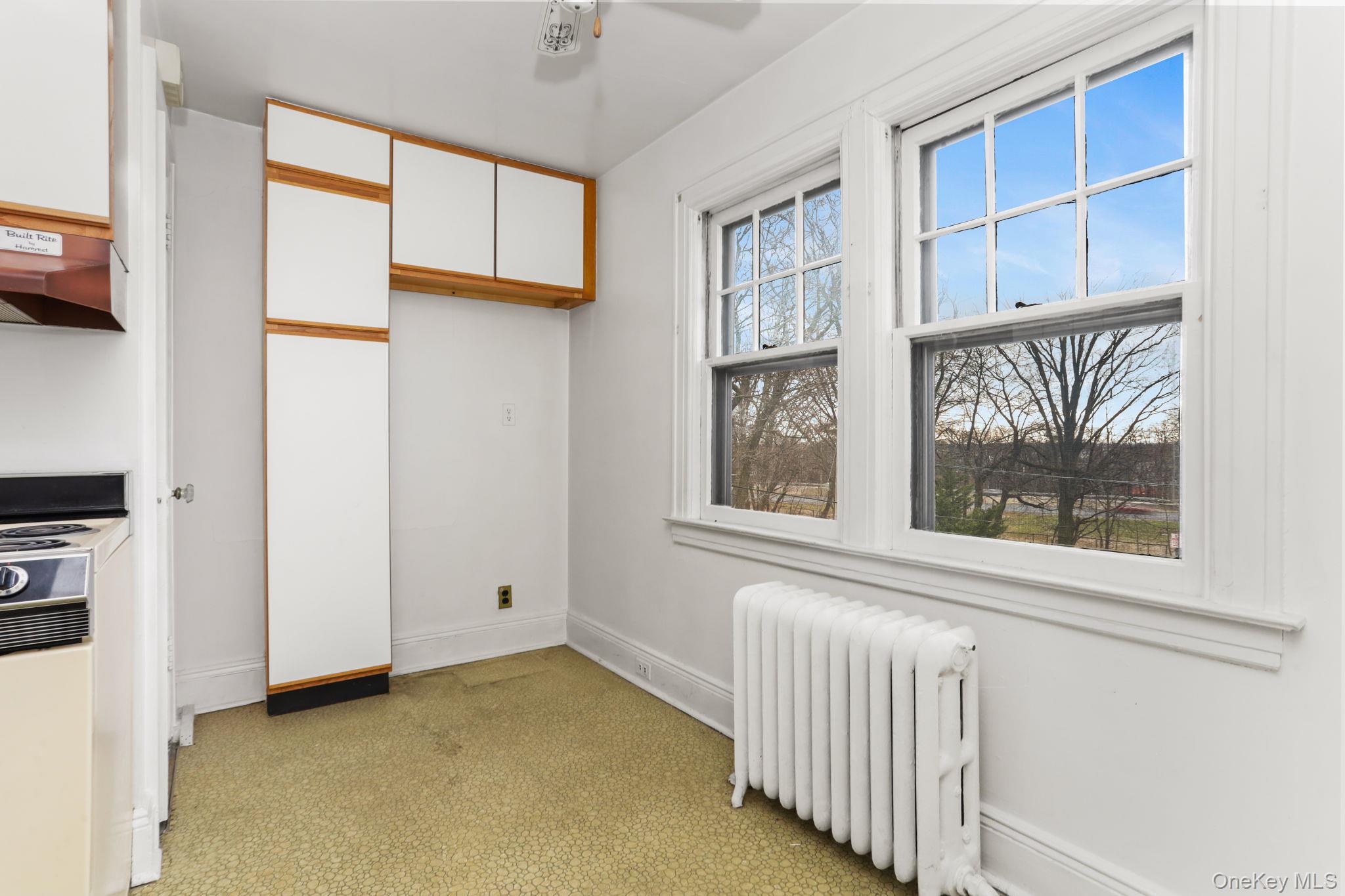 3 Hill Street New Rochelle, NY 10801 - Photo 23 of 46 a view of an empty room with a window
