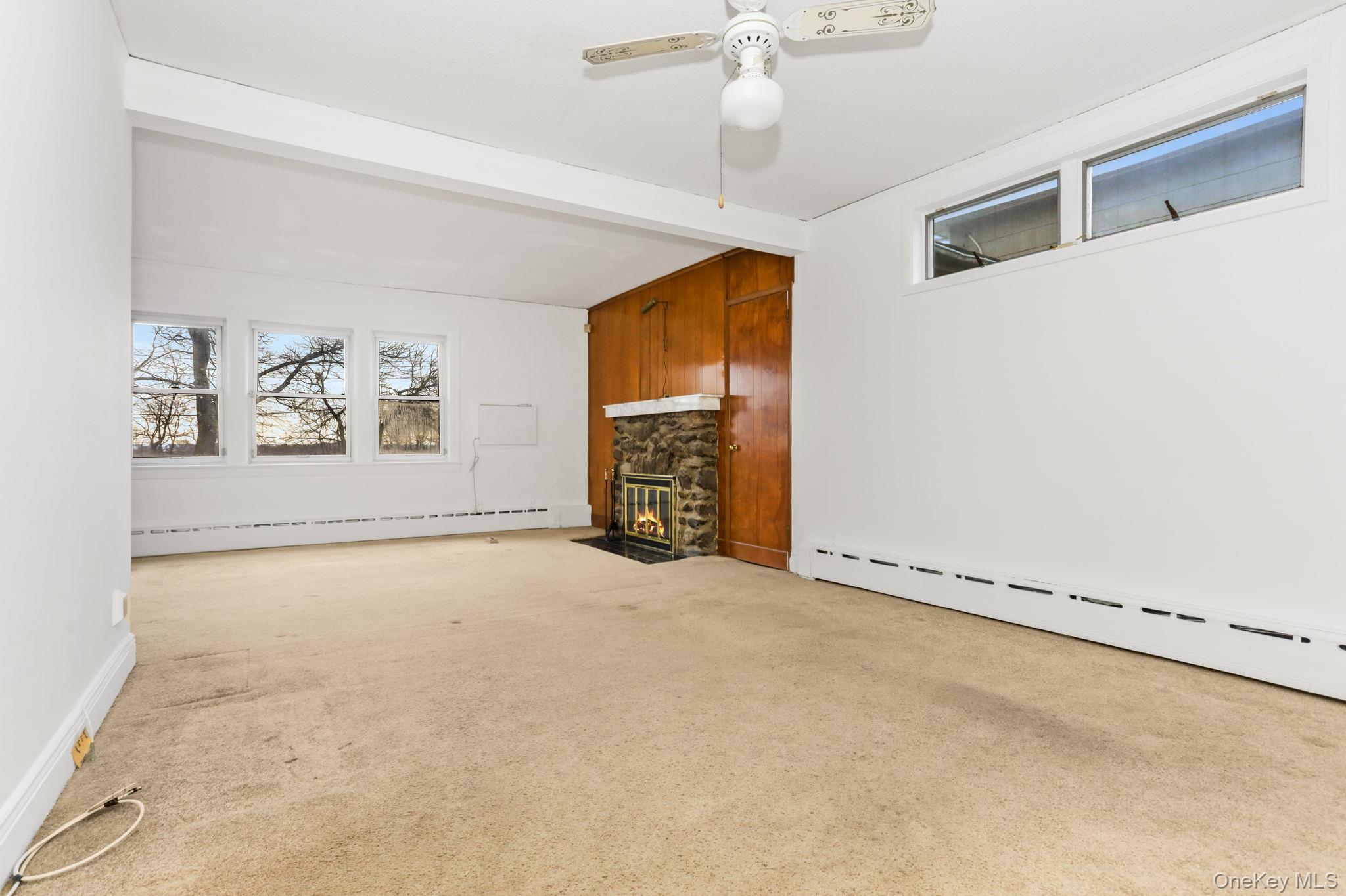 3 Hill Street New Rochelle, NY 10801 - Photo 5 of 46 a view of an empty room with a window