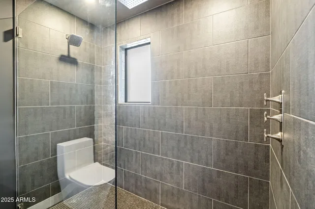 a view of a balcony with a potted plant