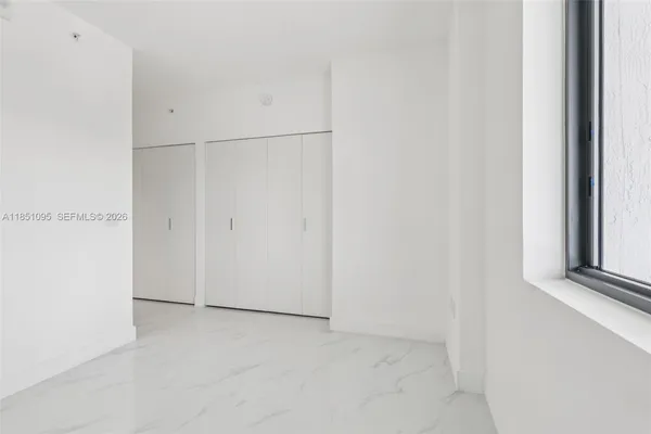 an empty room with a window