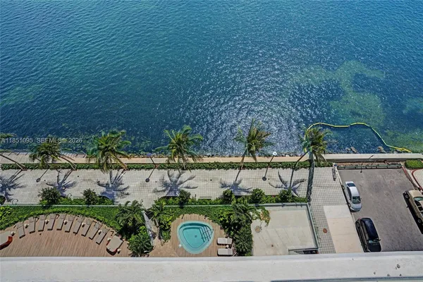 a view of swimming pool and outdoor seating