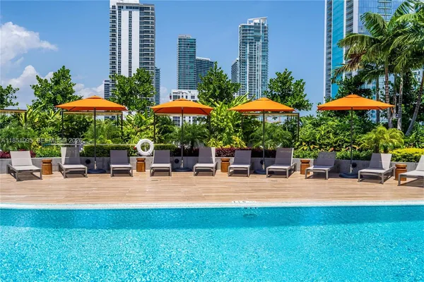 an outdoor space with patio and outdoor seating