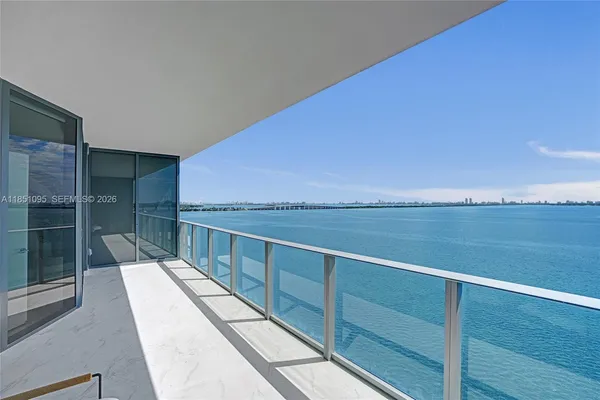 a view of a balcony with lake view