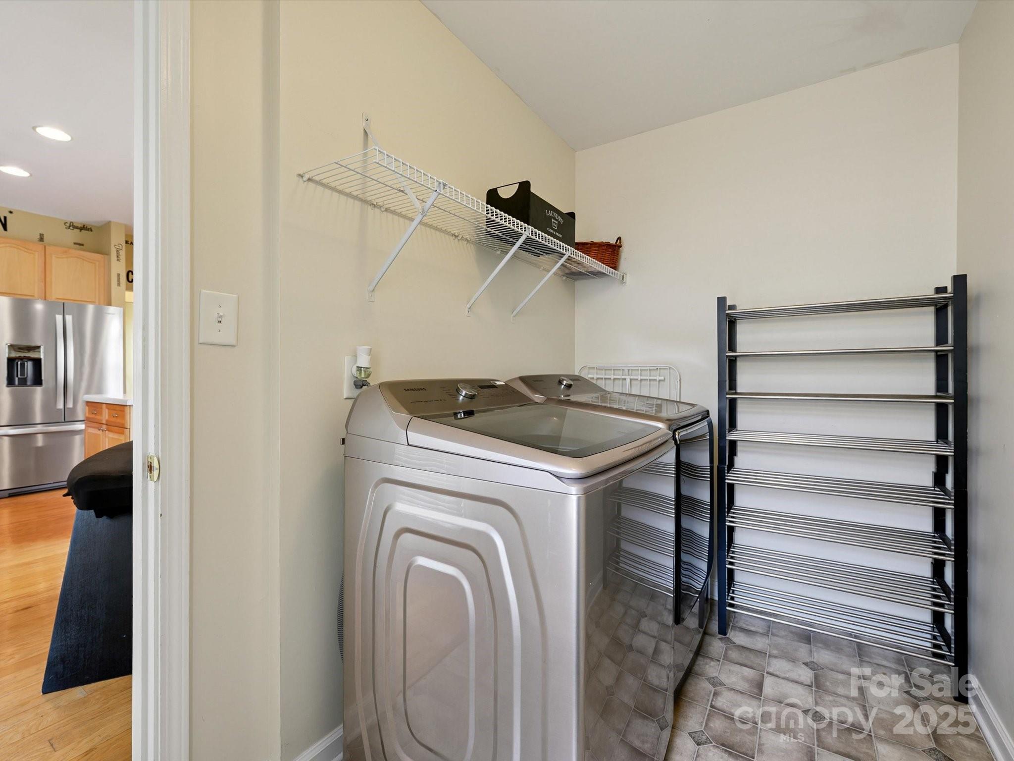 4959 Prosperity Ridge Road Charlotte, NC 28269 - Photo 14 of 40 a utility room with dryer and washer