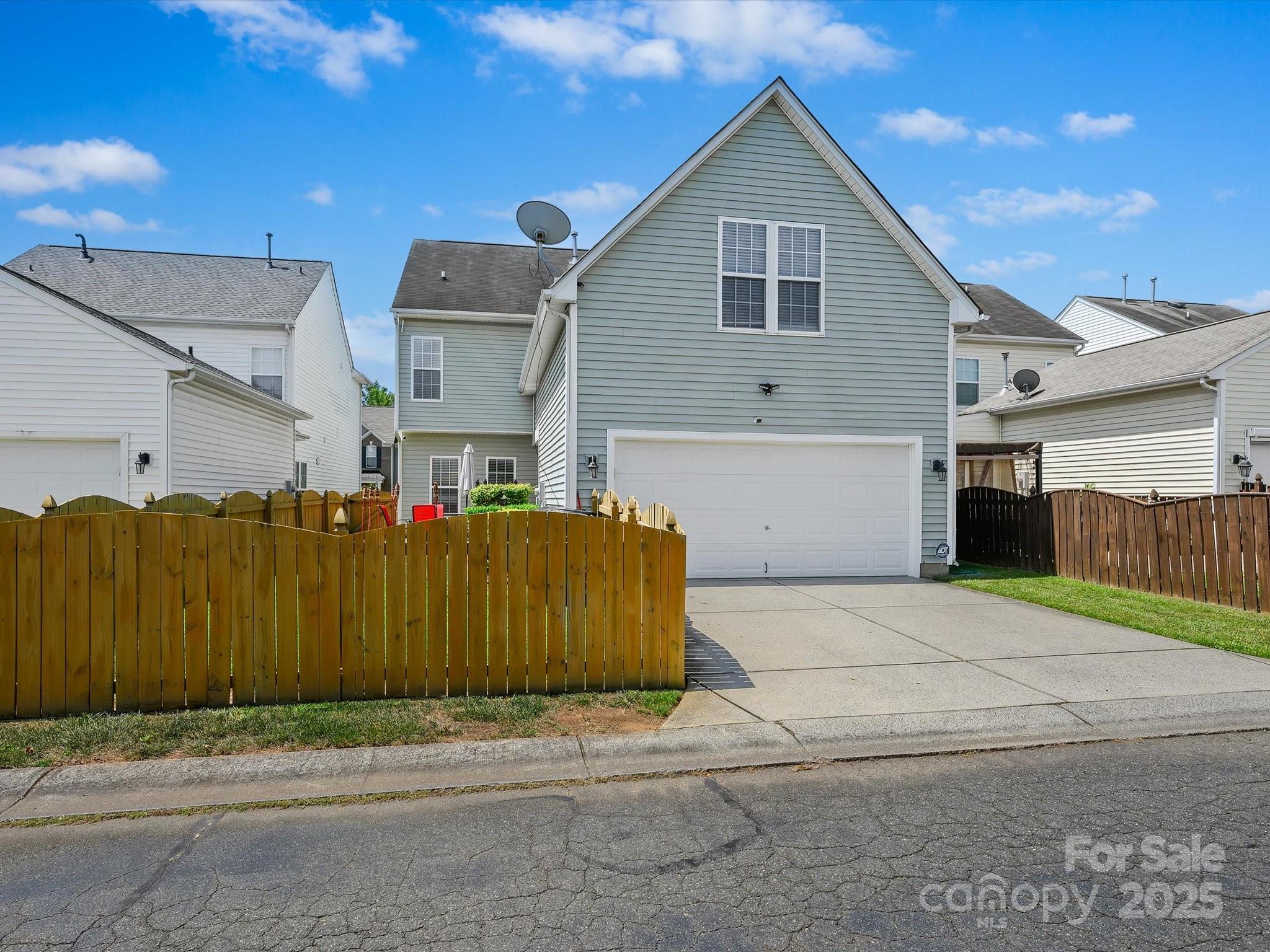 4959 Prosperity Ridge Road Charlotte, NC 28269 - Photo 33 of 40 a front view of a house with a yard