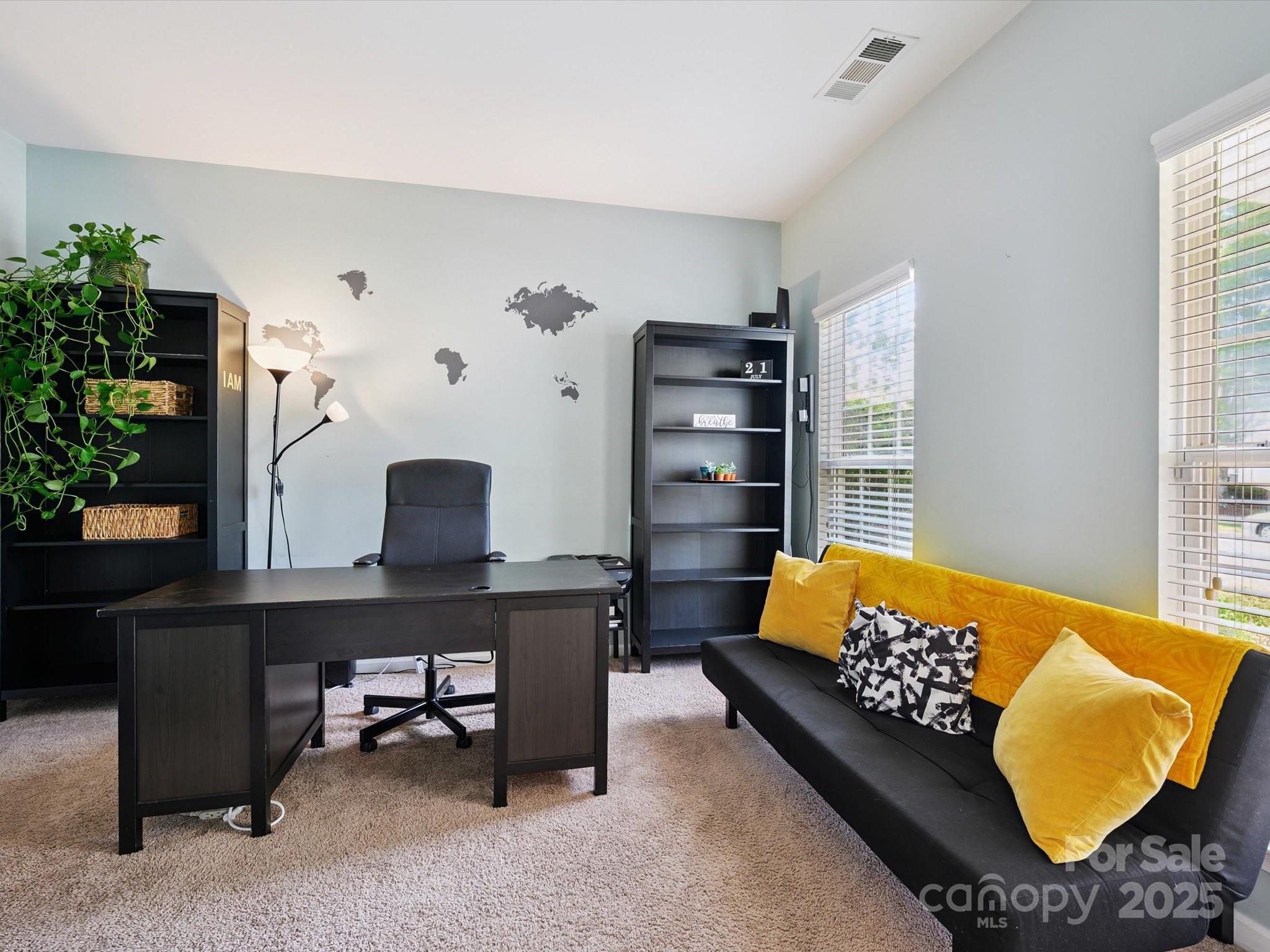 4959 Prosperity Ridge Road Charlotte, NC 28269 - Photo 5 of 40 a bedroom with a bed and a window