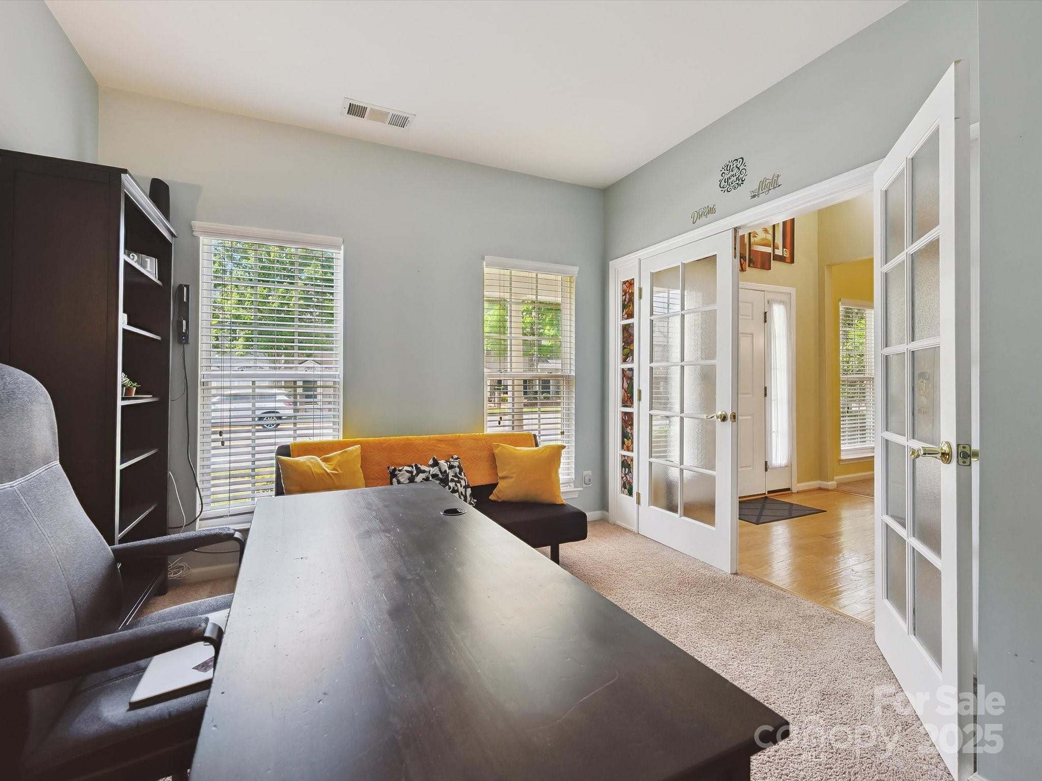 4959 Prosperity Ridge Road Charlotte, NC 28269 - Photo 6 of 40 a living room with furniture and a large window