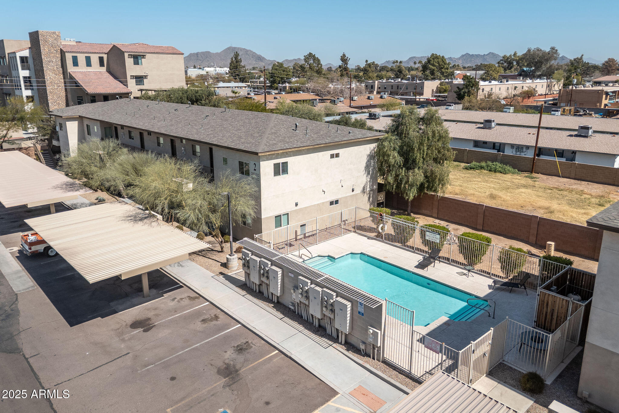 2016 West Orangewood Avenue Phoenix, AZ 85021 - Photo 11 of 22 a view of a house with pool and chairs