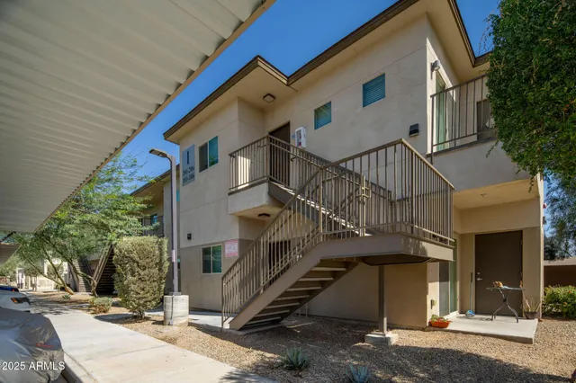 a view of a house with a street