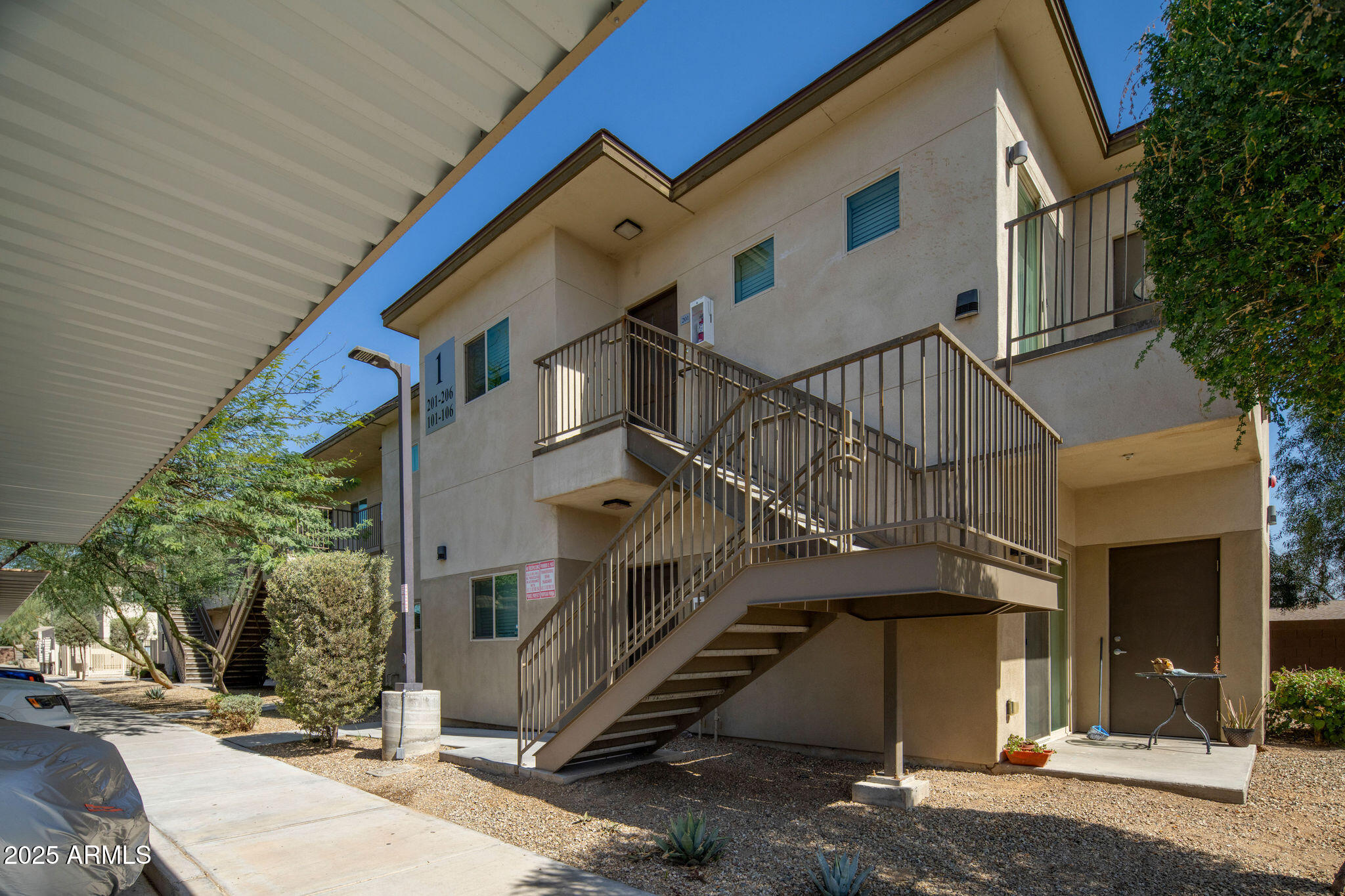 2016 West Orangewood Avenue Phoenix, AZ 85021 - Photo 5 of 22 a view of a house with a street