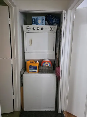 a view of a table and chairs in a small living room