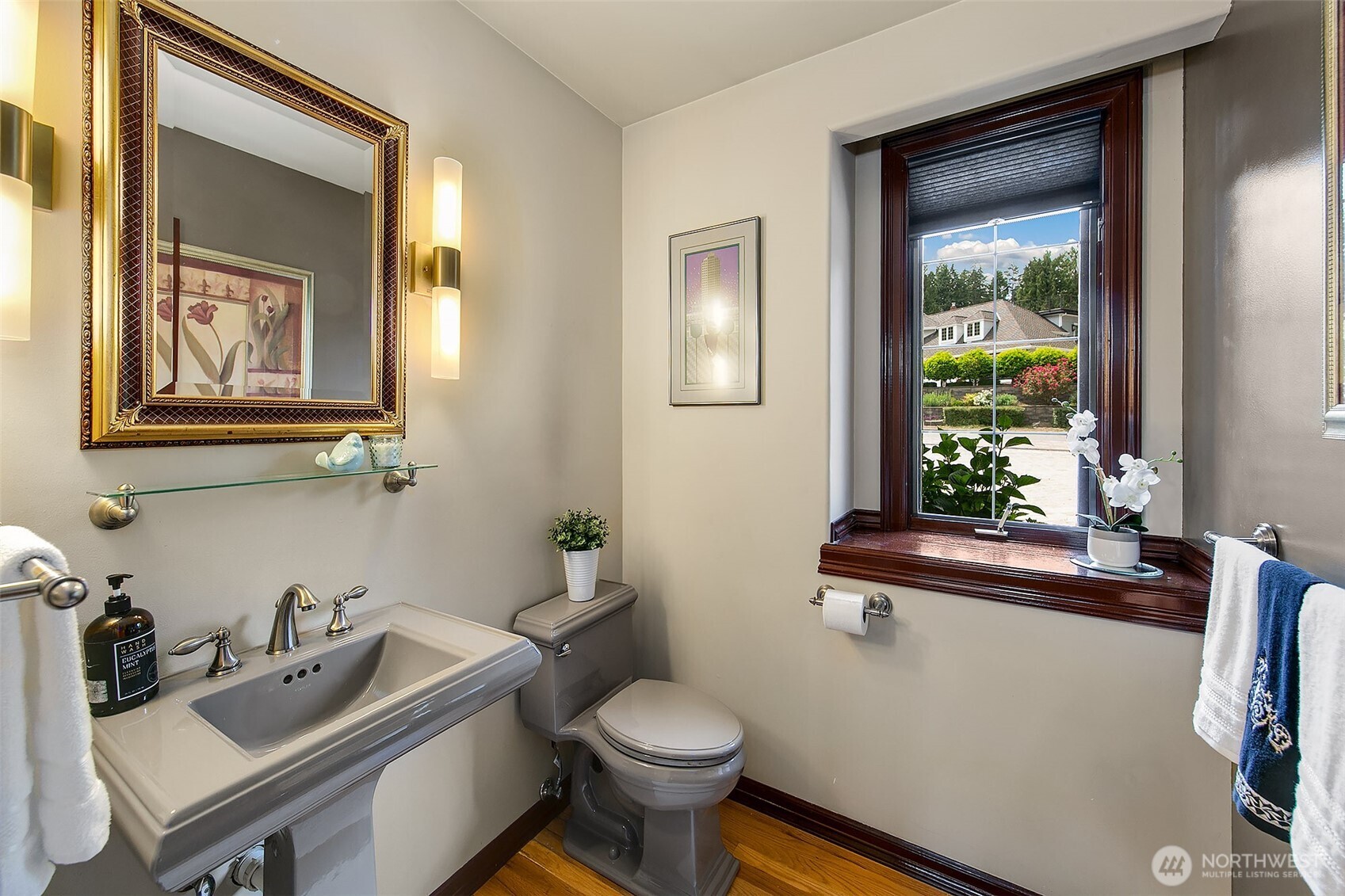 21031 49th Avenue Southeast Bothell, WA 98021 - Photo 15 of 40 a bathroom with a toilet sink and mirror