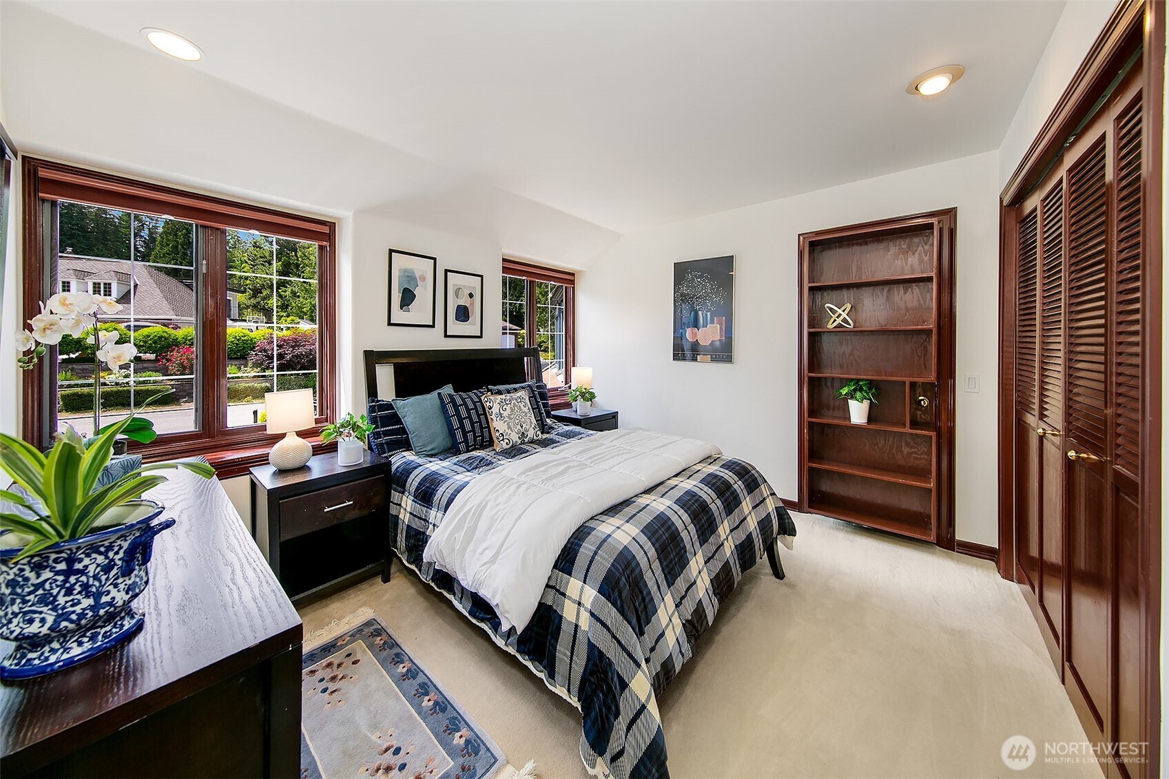 21031 49th Avenue Southeast Bothell, WA 98021 - Photo 24 of 40 a bedroom with a large bed and a window