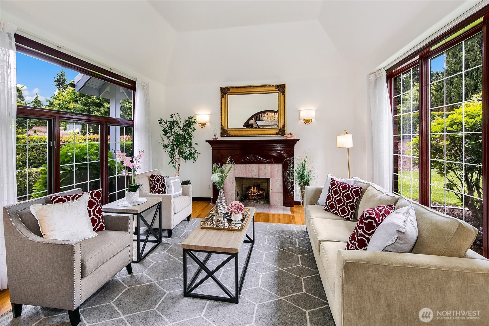 21031 49th Avenue Southeast Bothell, WA 98021 - Photo 6 of 40 a living room with furniture a large window and a fireplace