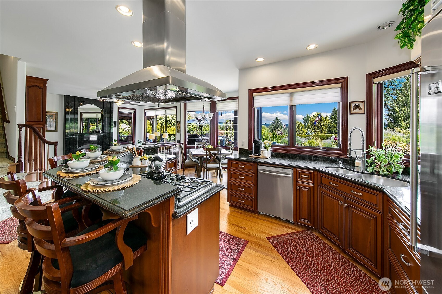 21031 49th Avenue Southeast Bothell, WA 98021 - Photo 10 of 40 a kitchen with a stove a sink and a refrigerator