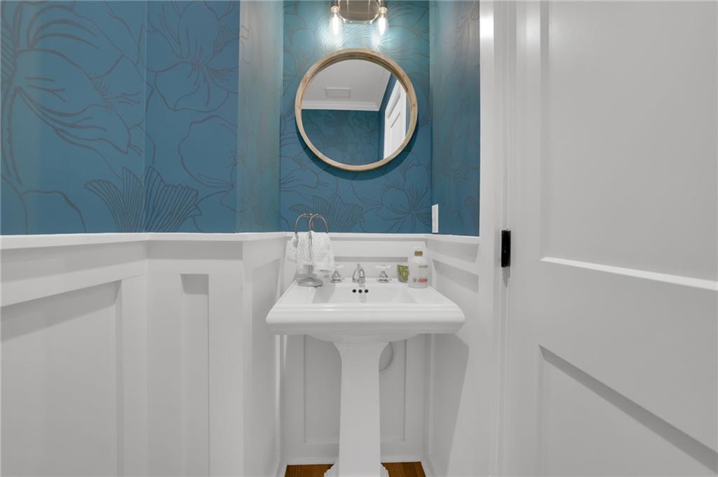 2602 Tanglewood Road Decatur, GA 30033 - Photo 16 of 37 a bathroom with a sink and a mirror