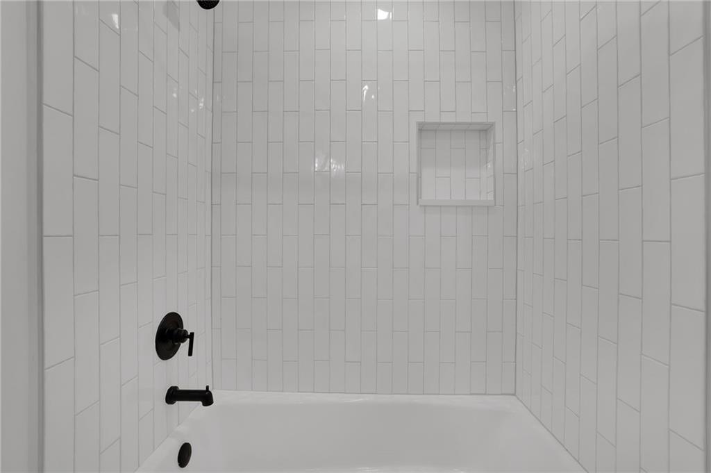 2602 Tanglewood Road Decatur, GA 30033 - Photo 27 of 37 a bathroom with a shower