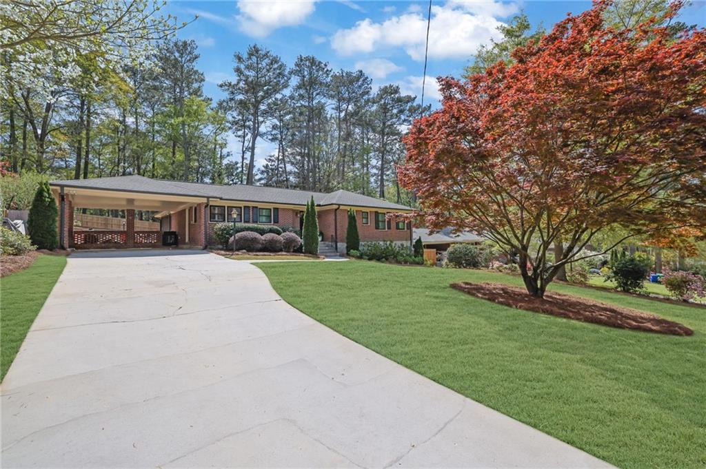 2602 Tanglewood Road Decatur, GA 30033 - Photo 3 of 37 a view of a house with a yard
