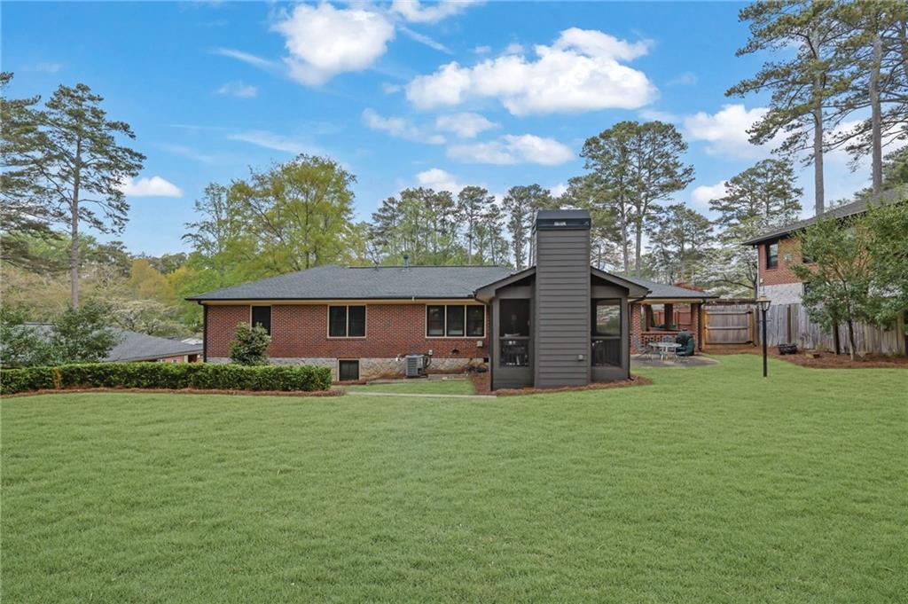 2602 Tanglewood Road Decatur, GA 30033 - Photo 33 of 37 a house view with a sitting space and garden