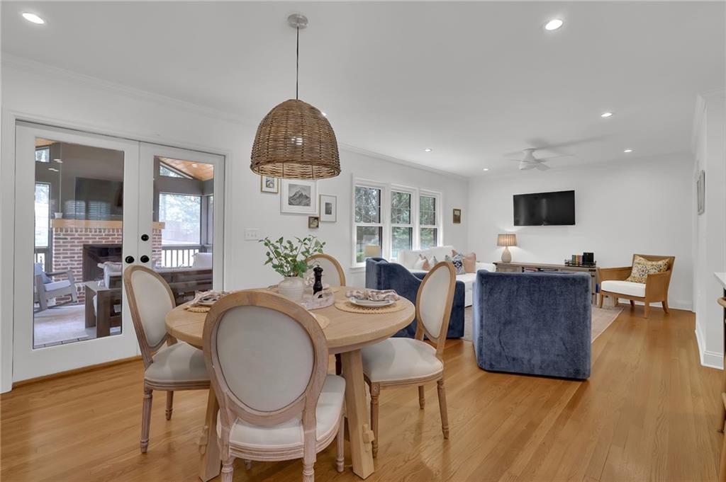 2602 Tanglewood Road Decatur, GA 30033 - Photo 5 of 37 a dining room with furniture a window and wooden floor