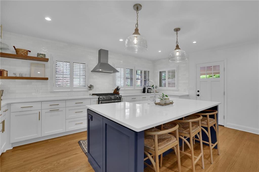 2602 Tanglewood Road Decatur, GA 30033 - Photo 9 of 37 a kitchen with a sink a counter space appliances and cabinets