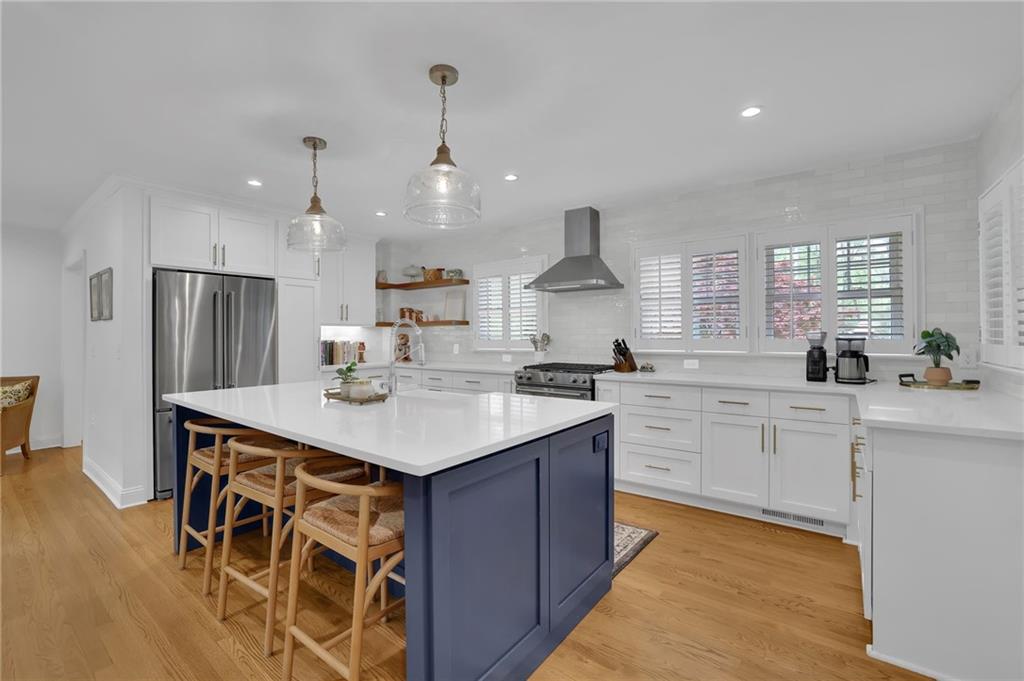 2602 Tanglewood Road Decatur, GA 30033 - Photo 10 of 37 a kitchen with a sink stainless steel appliances and cabinets